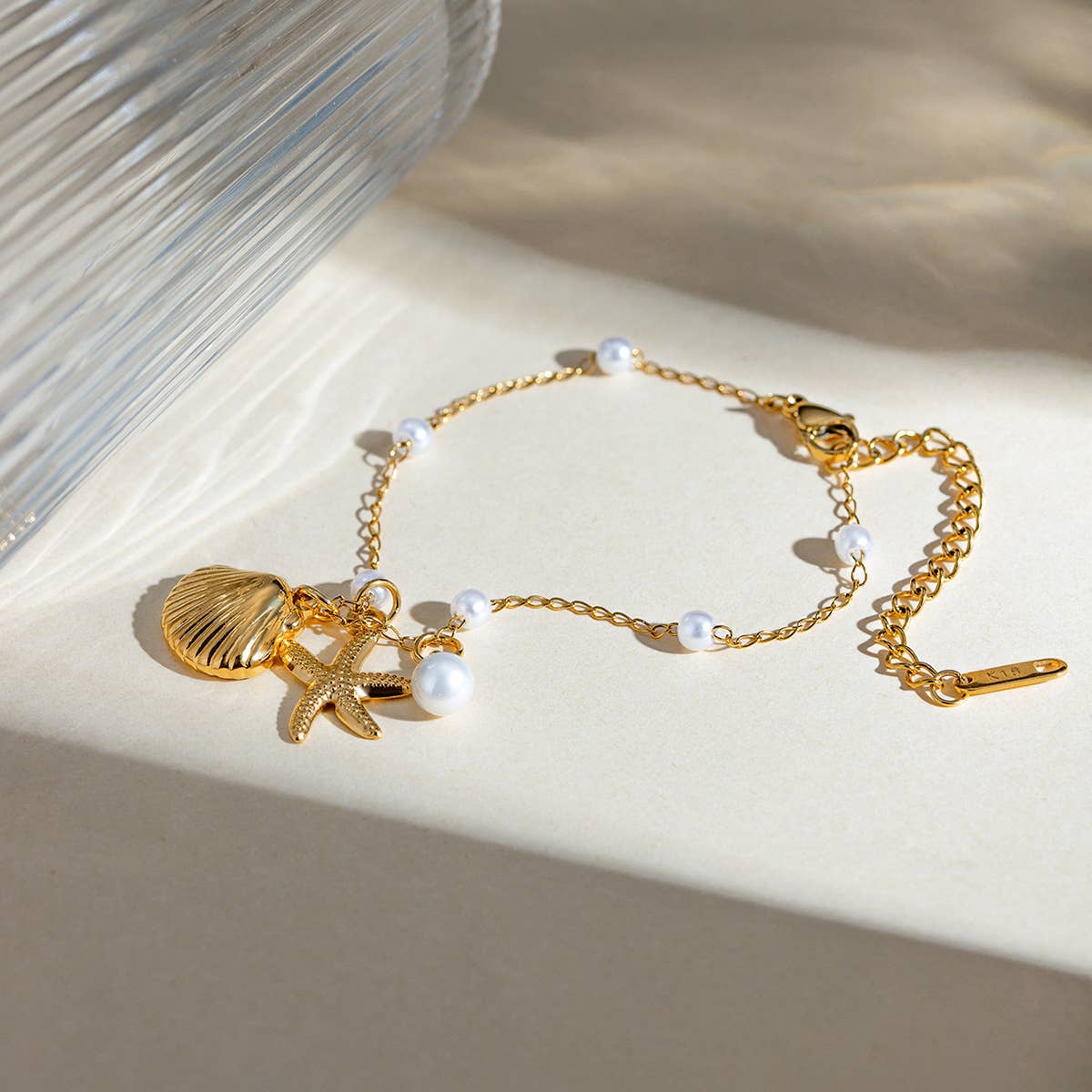 Shell Starfish & Pearl Charm Bracelet in Gold
